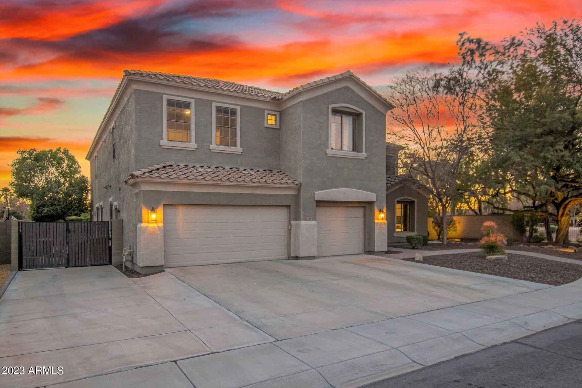 1721 E WOODSMAN Place