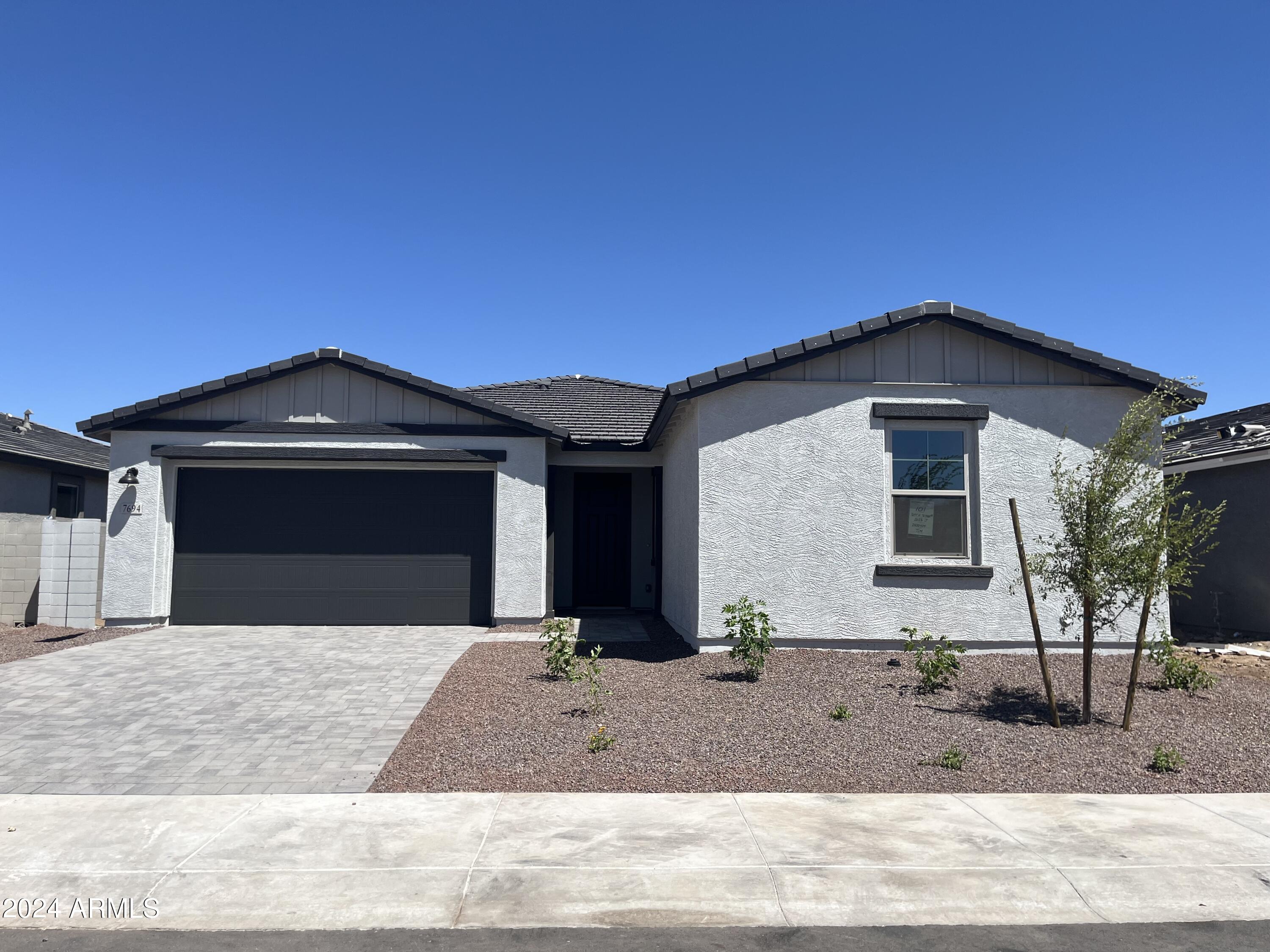 7694 W TETHER Trail