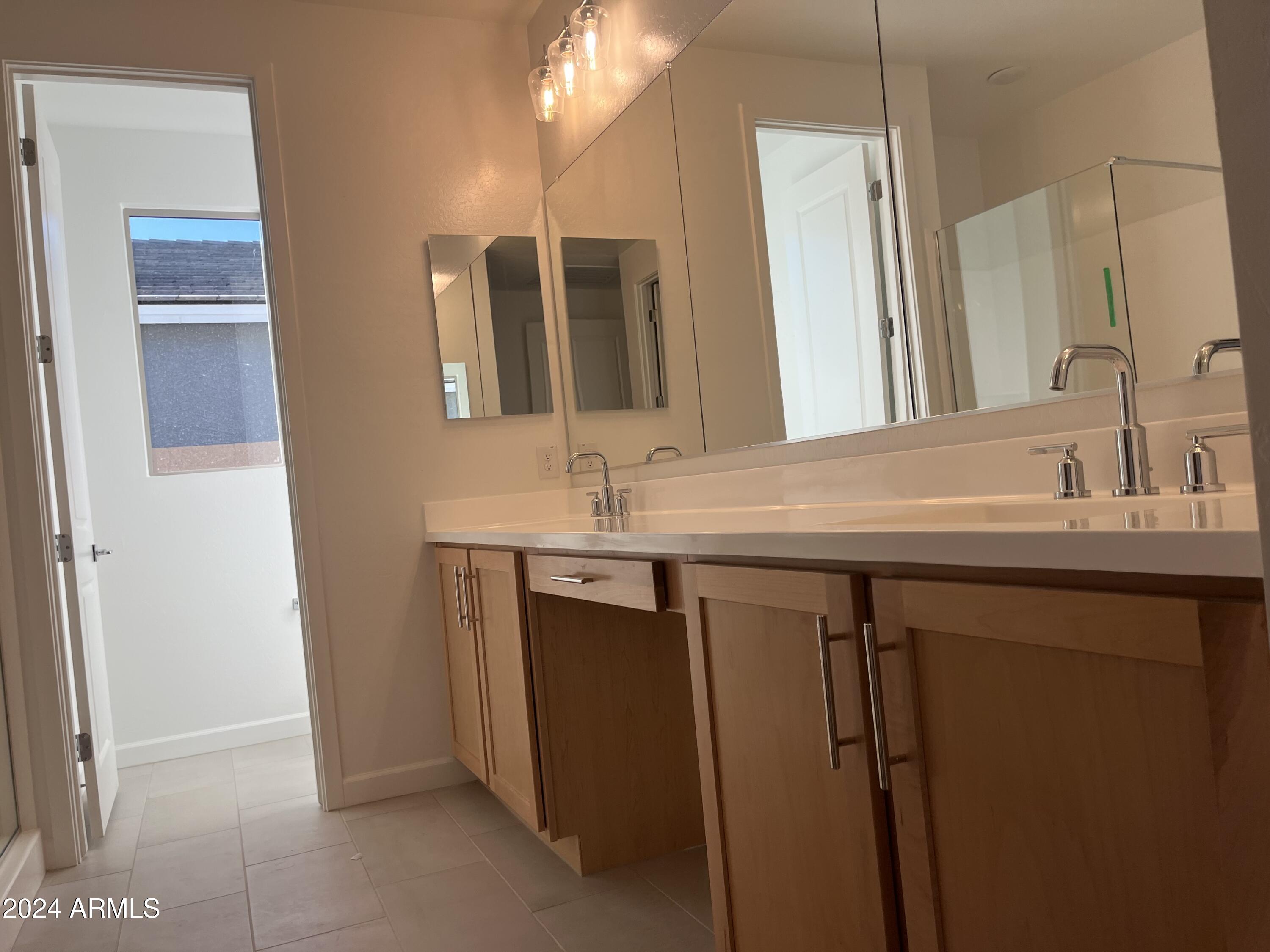 7674 W TETHER Trail