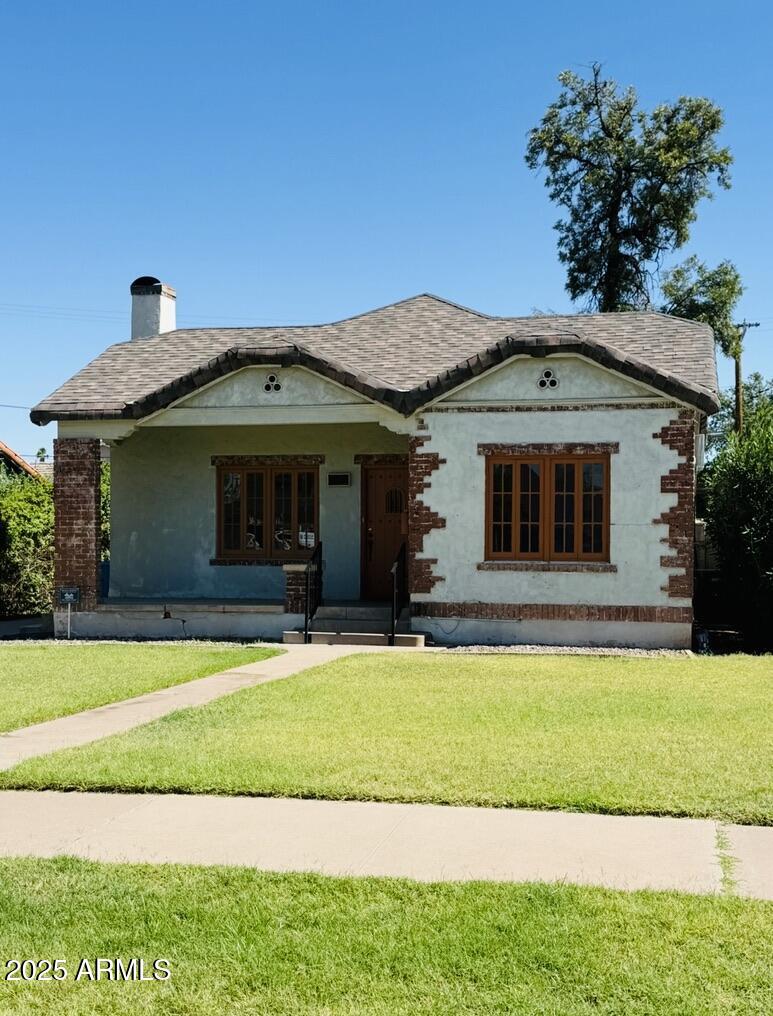 1625 W VERNON Avenue