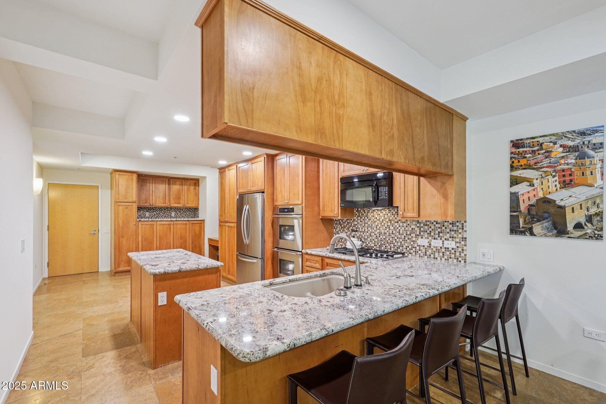 7161 E RANCHO VISTA Drive, 2002