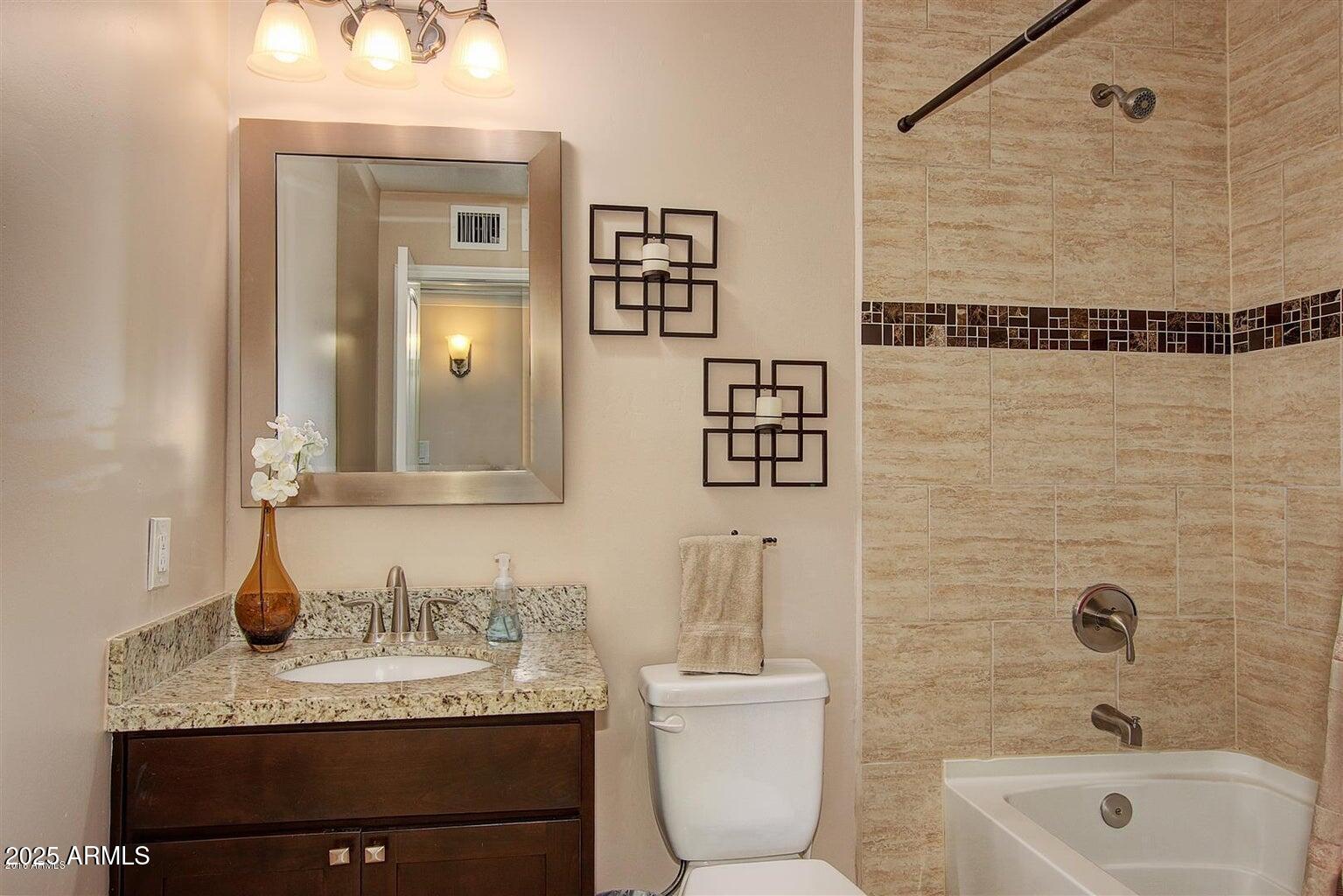 8143 E CLARENDON Avenue