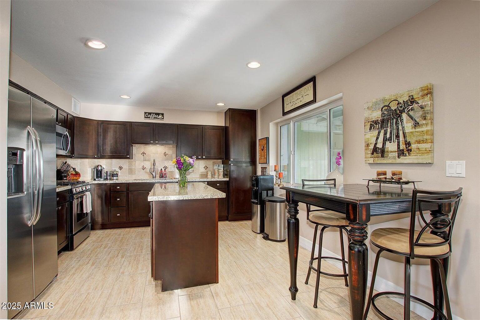 8143 E CLARENDON Avenue