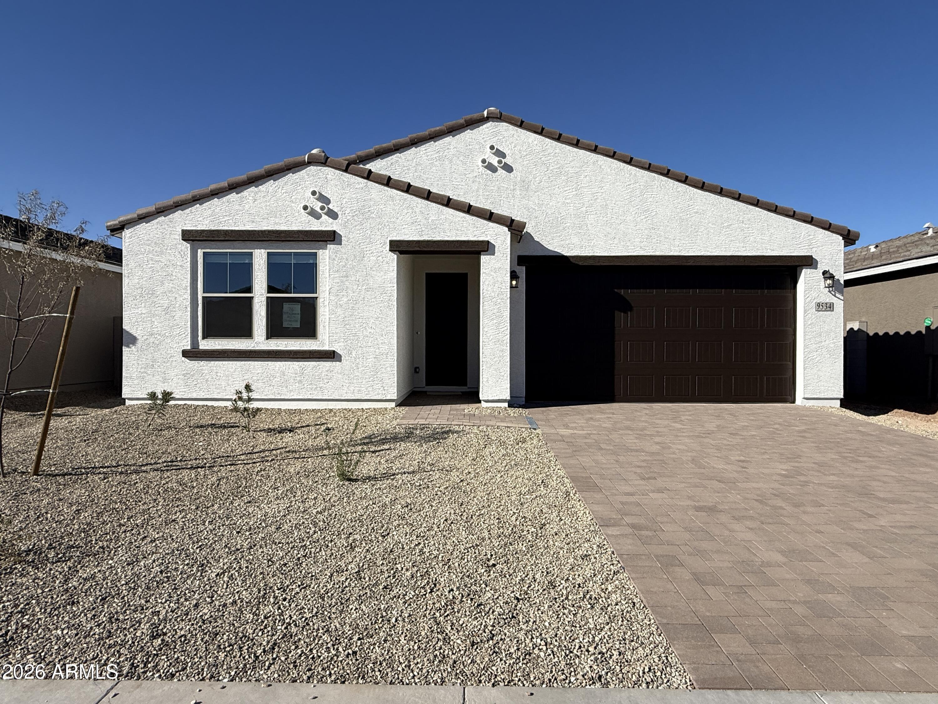 9534 W TAMARISK Avenue