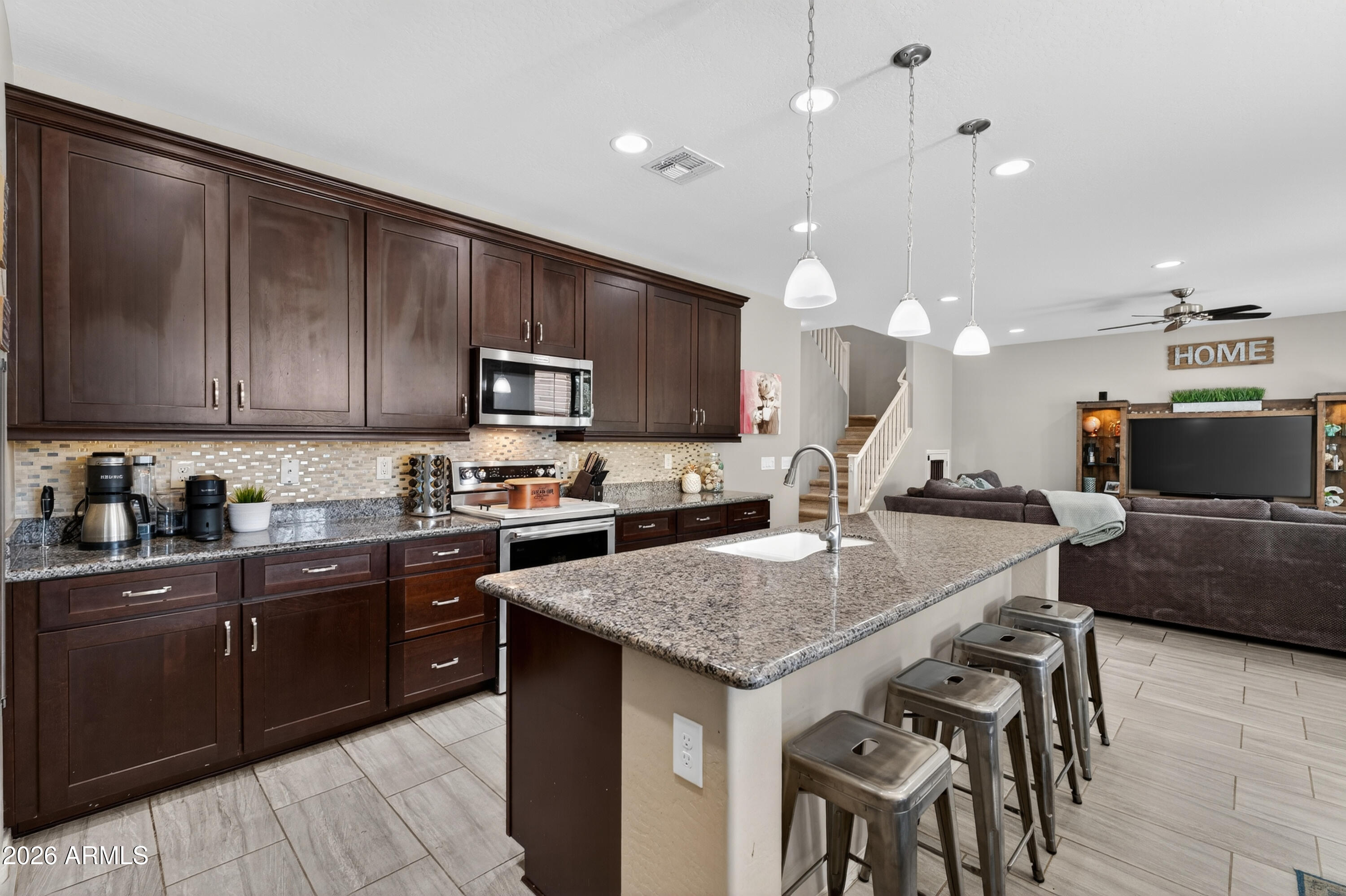 12065 W ROWEL Road