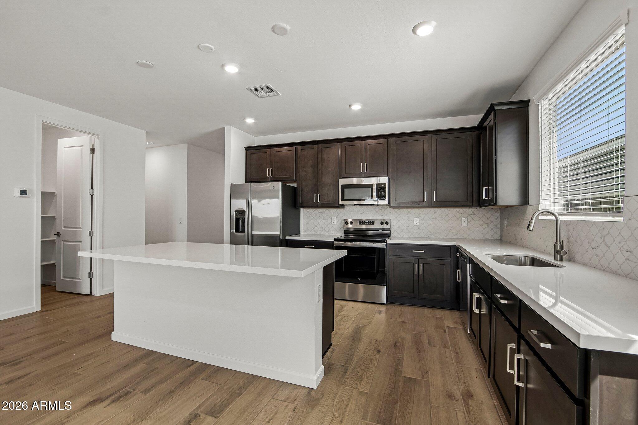 6603 E FIDDLENECK Way