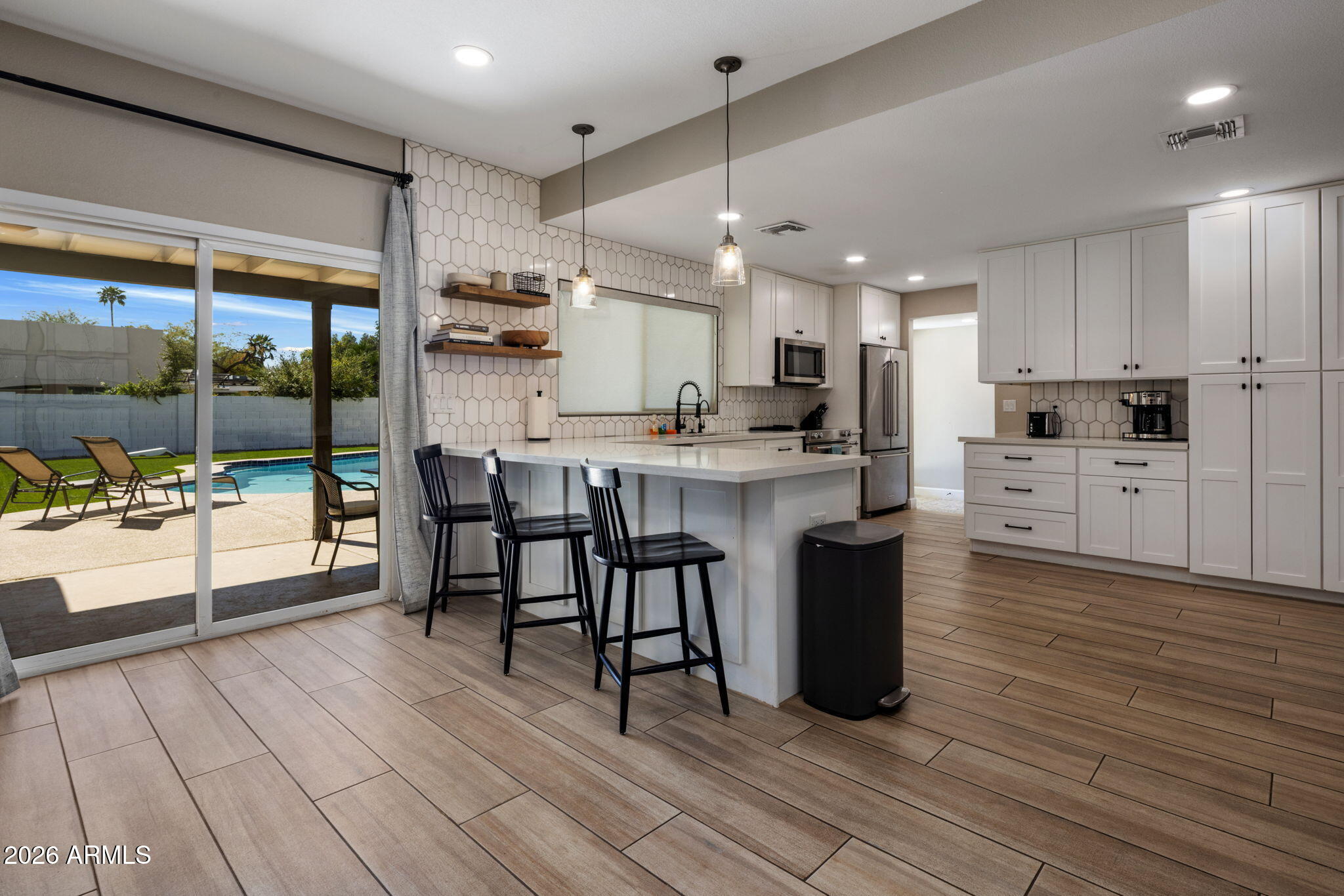 5839 E VOLTAIRE Avenue