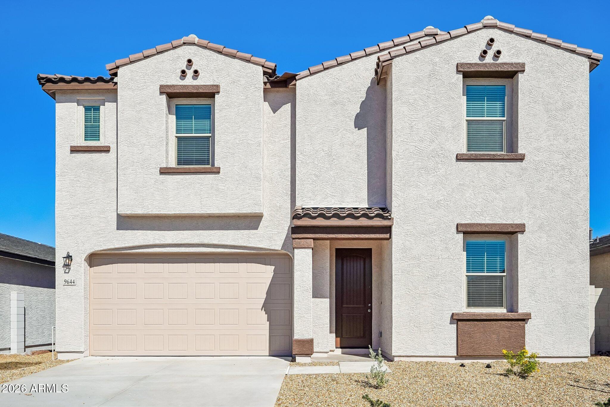 9644 W TAMARISK Avenue
