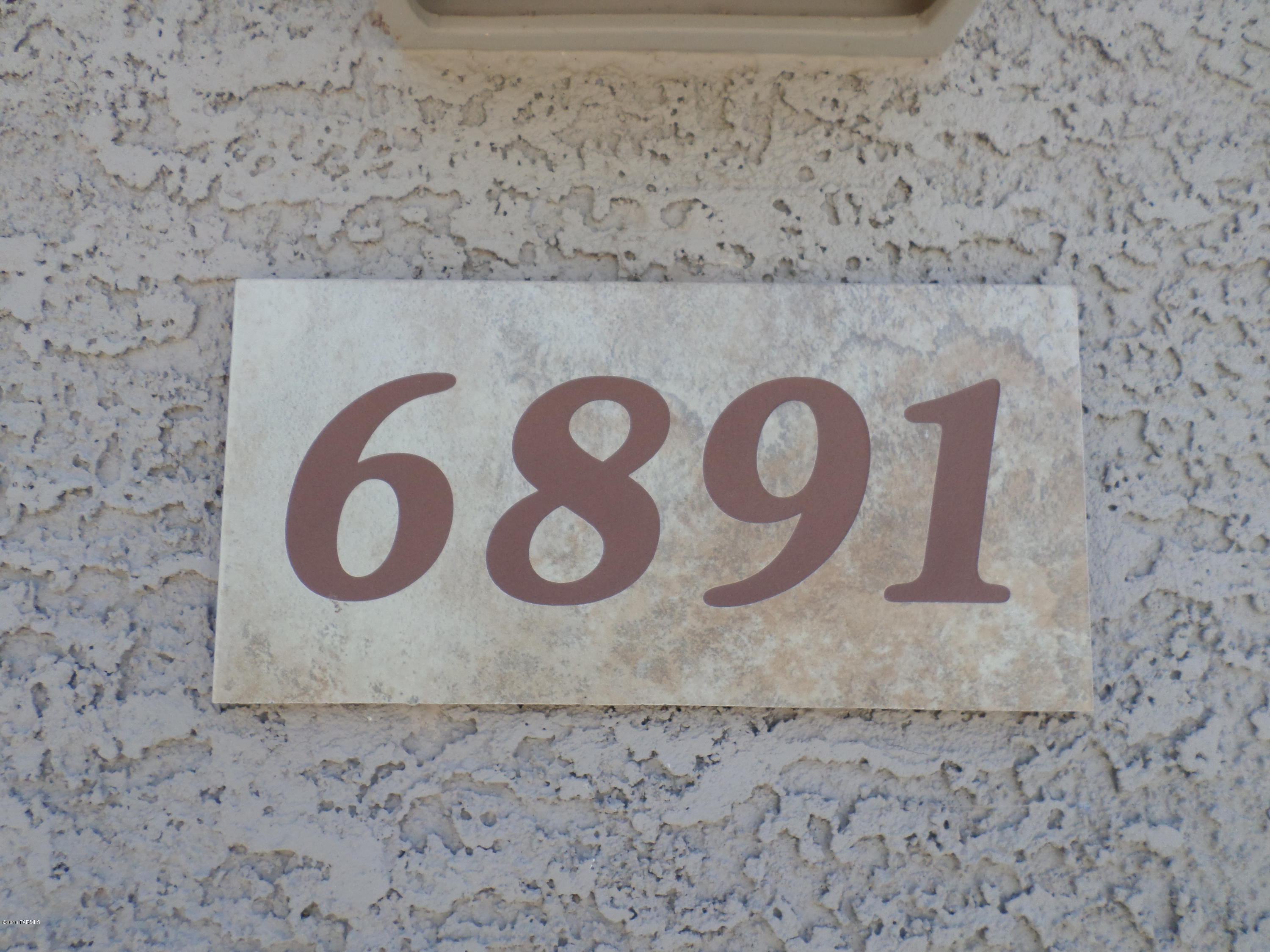 6891 W Leeward Cove Way