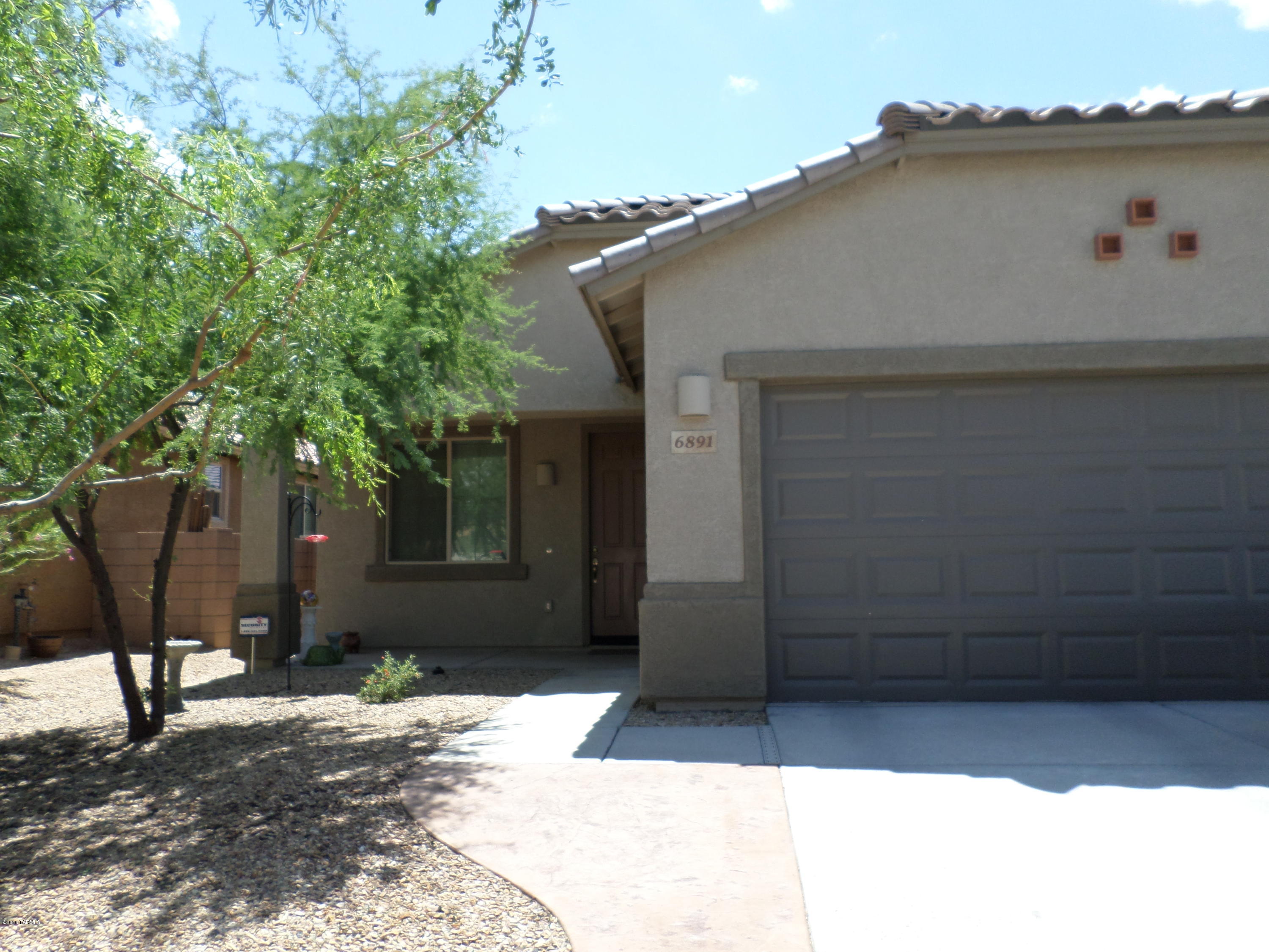 6891 W Leeward Cove Way