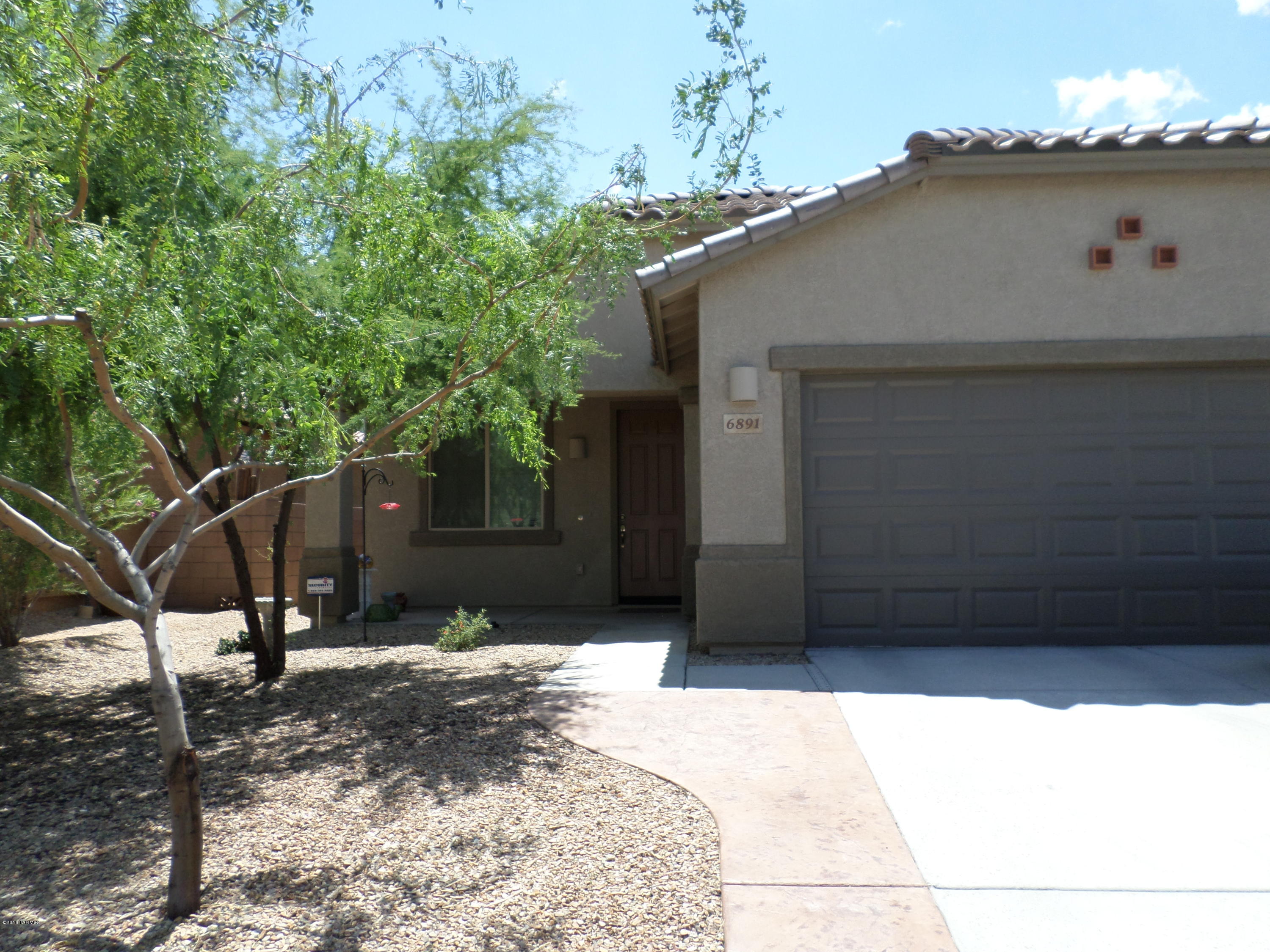 6891 W Leeward Cove Way