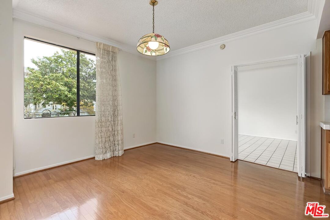 1201 S Roxbury Dr Unit: 107