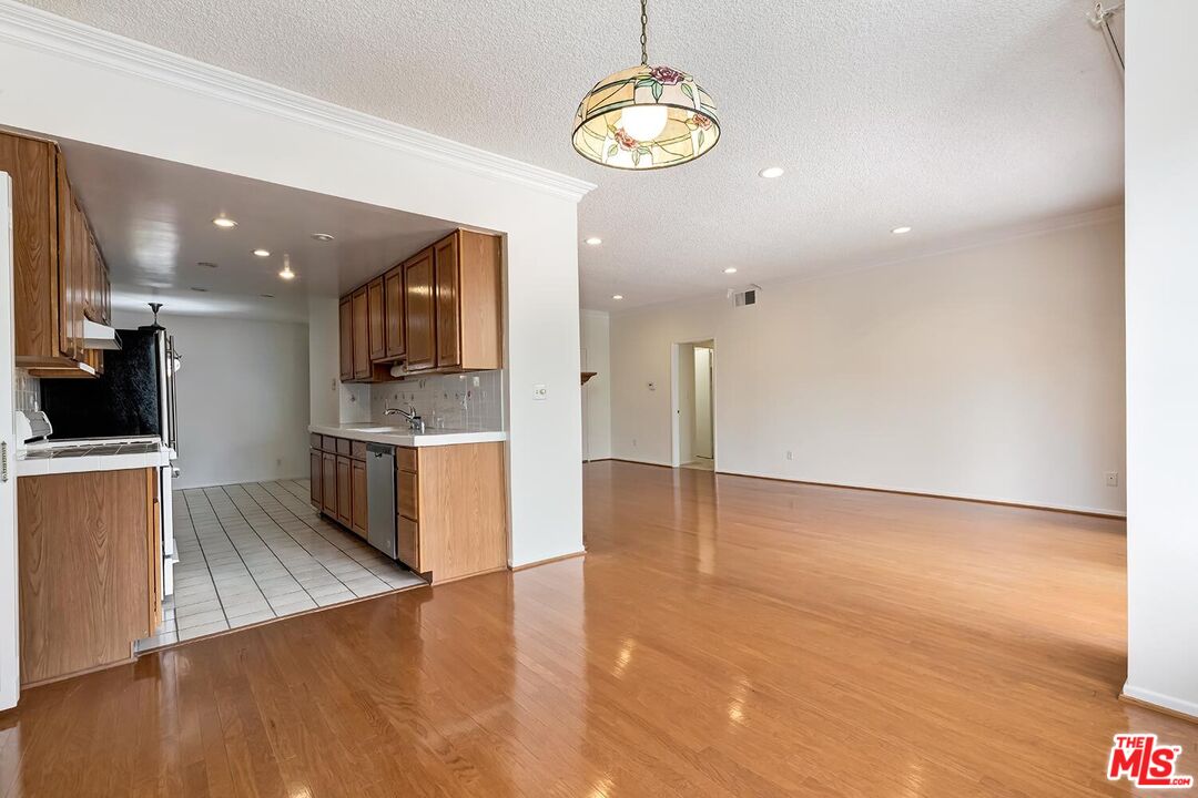 1201 S Roxbury Dr Unit: 107