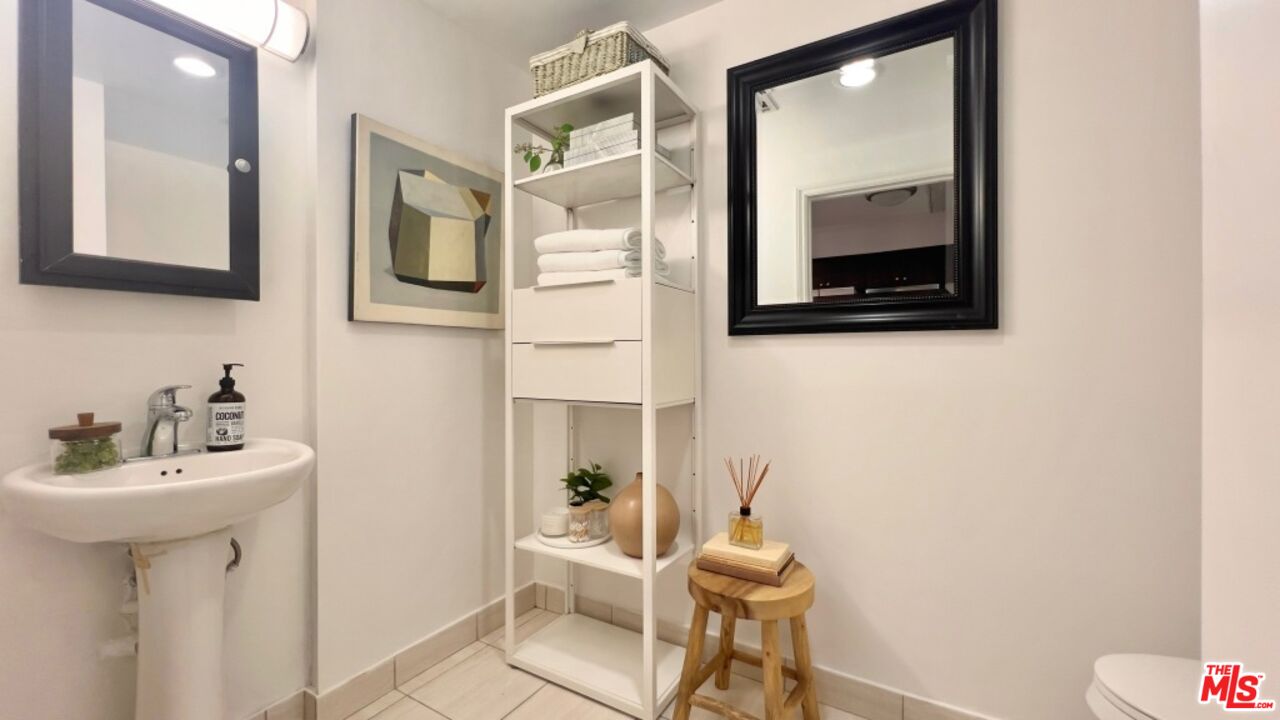 5633 Carlton Way Unit: 203