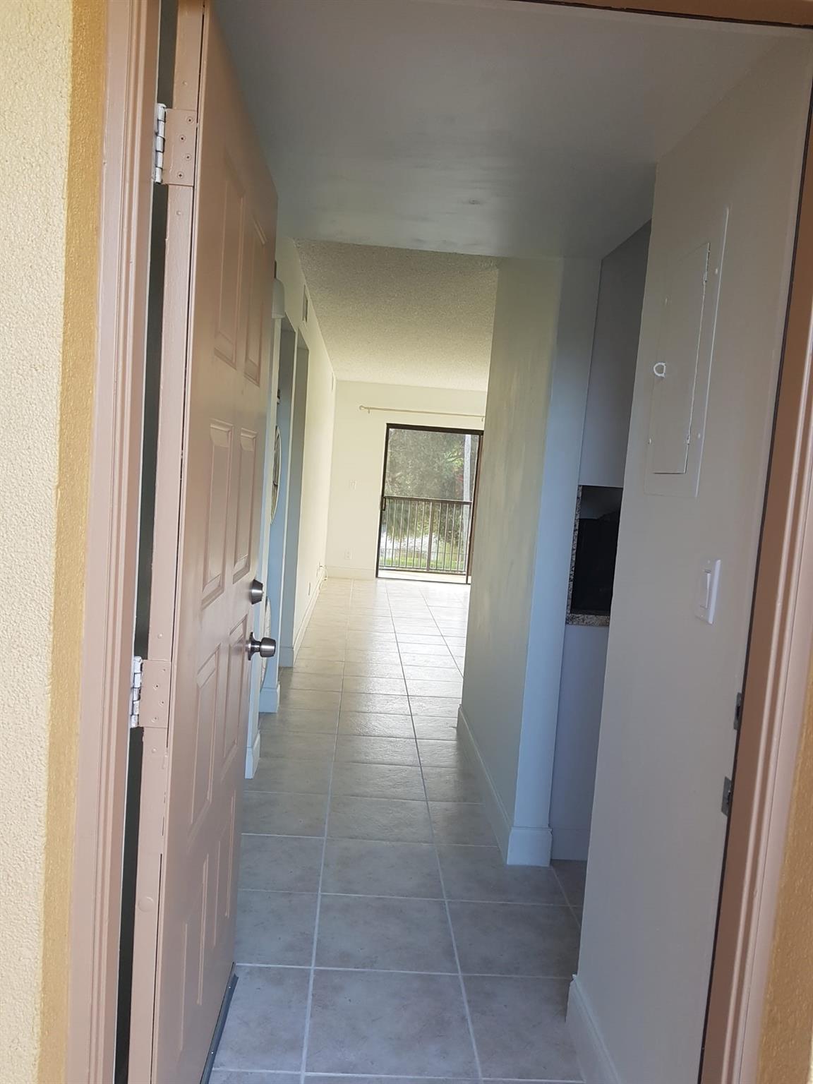 11453 NW 39th Ct Unit: 211