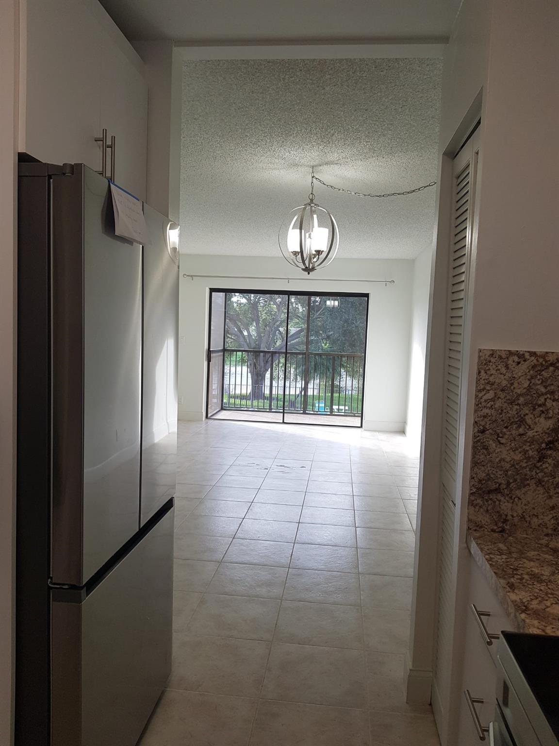 11453 NW 39th Ct Unit: 211