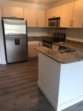 1865 Palm Cove Blvd 9-103