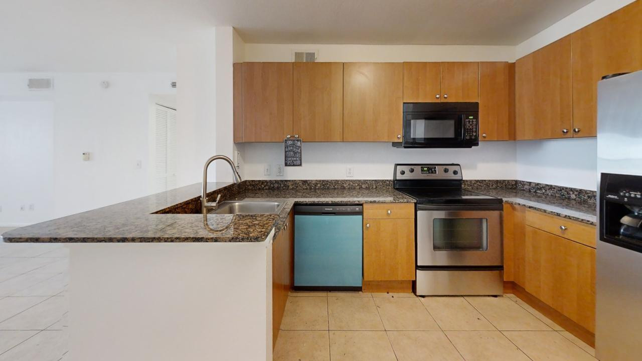 1705 Palm Cove Blvd 107