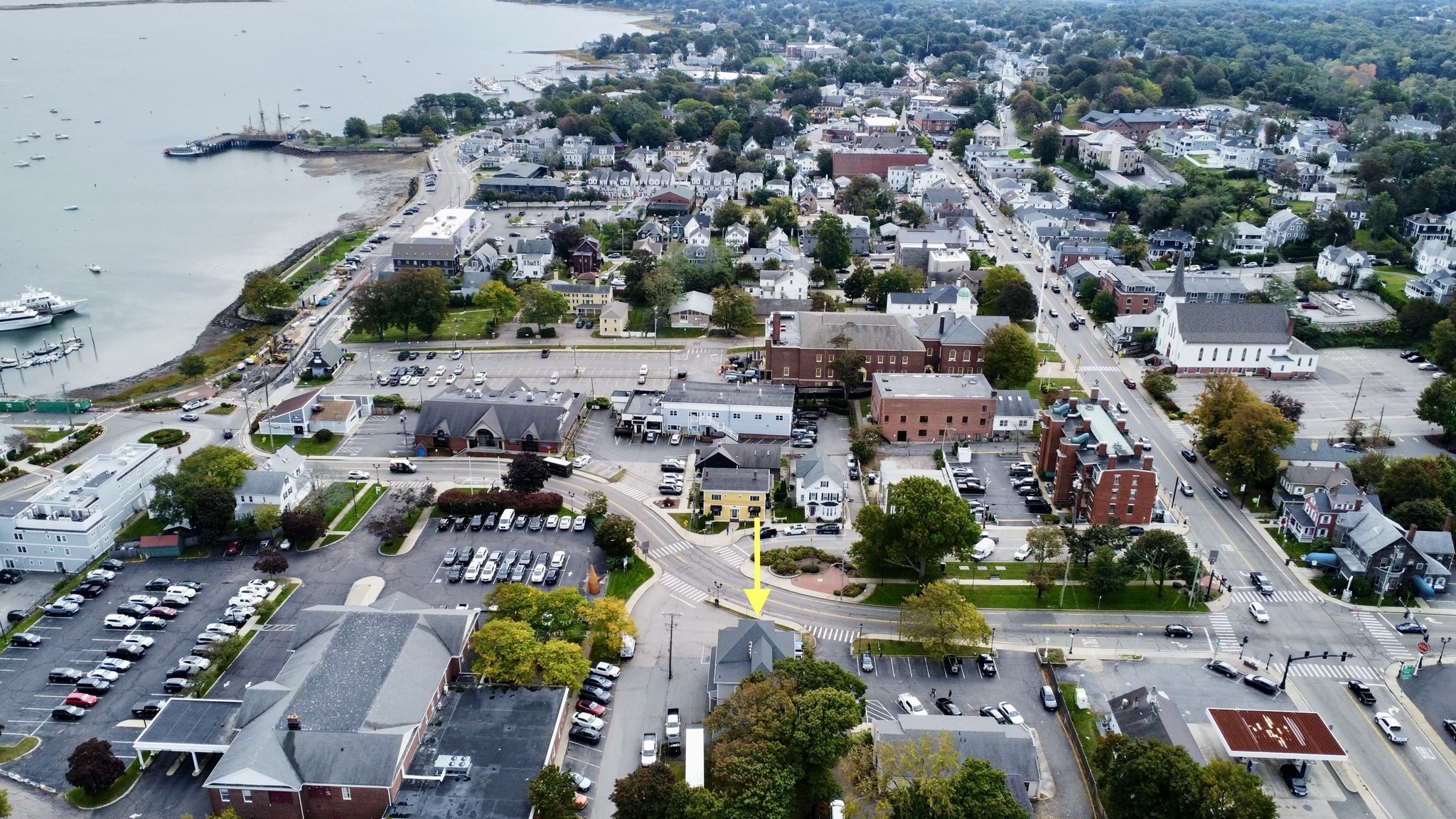 Aerial view of the marked downtown property near Plymouth Harbor, surrounded by streets and parking lots.