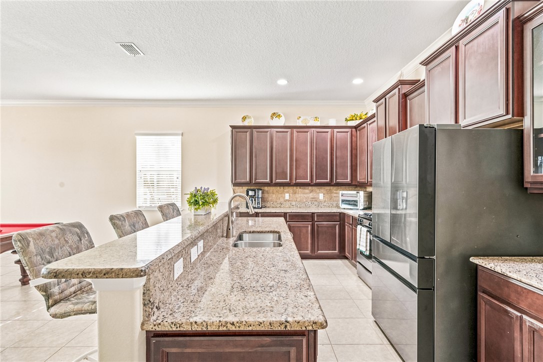 7277 E Village Square