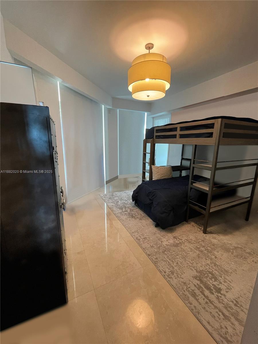 16047 Collins Ave # 404