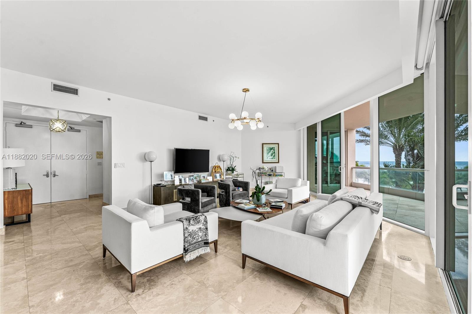 16047 Collins Ave # 404
