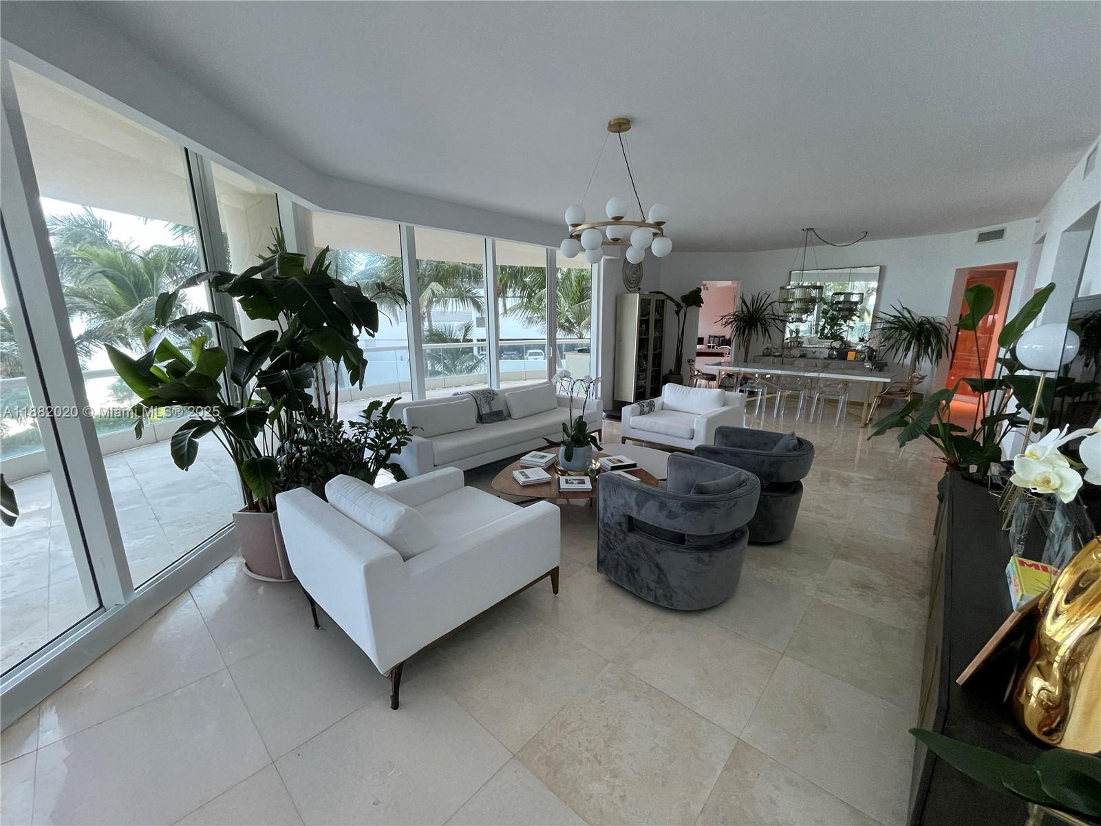 16047 Collins Ave # 404