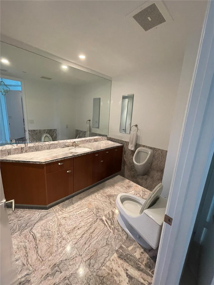 16047 Collins Ave # 404