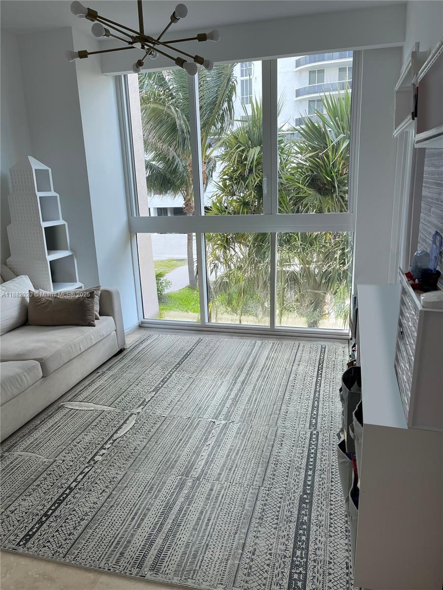 16047 Collins Ave # 404