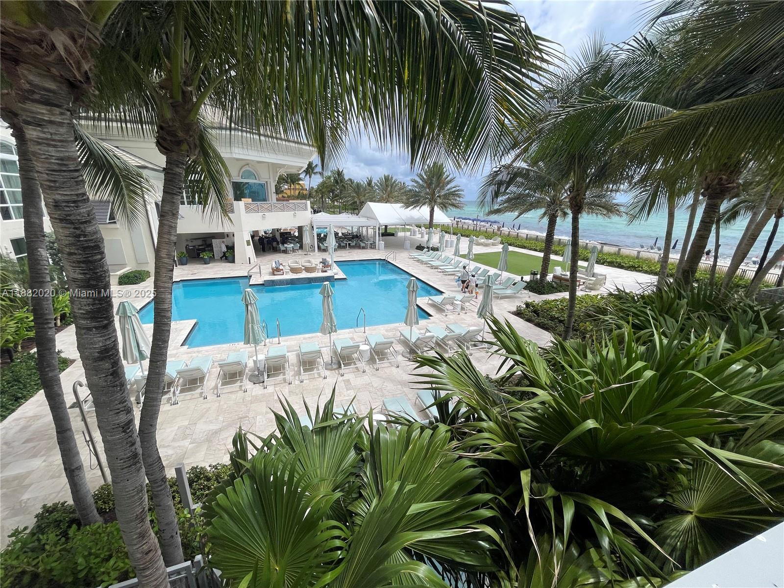 16047 Collins Ave # 404