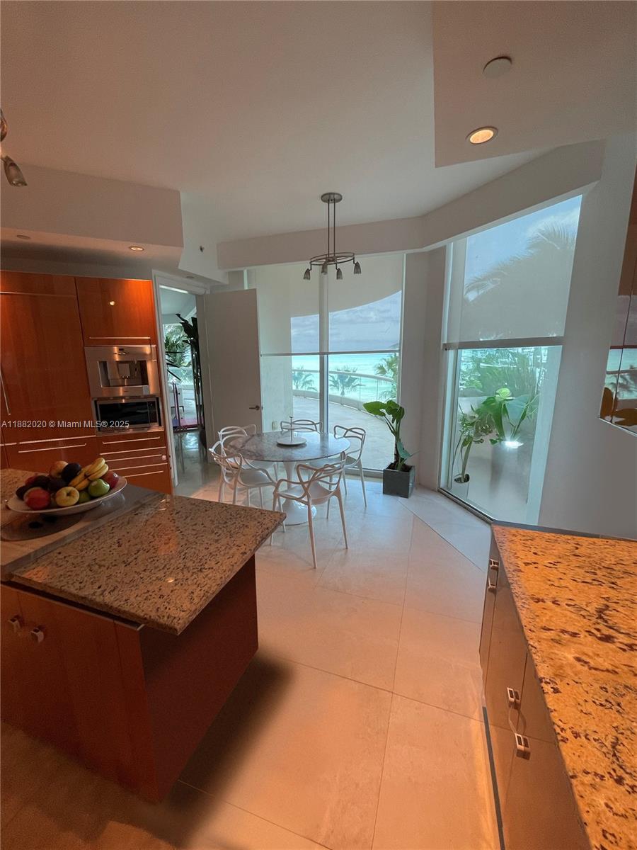 16047 Collins Ave # 404