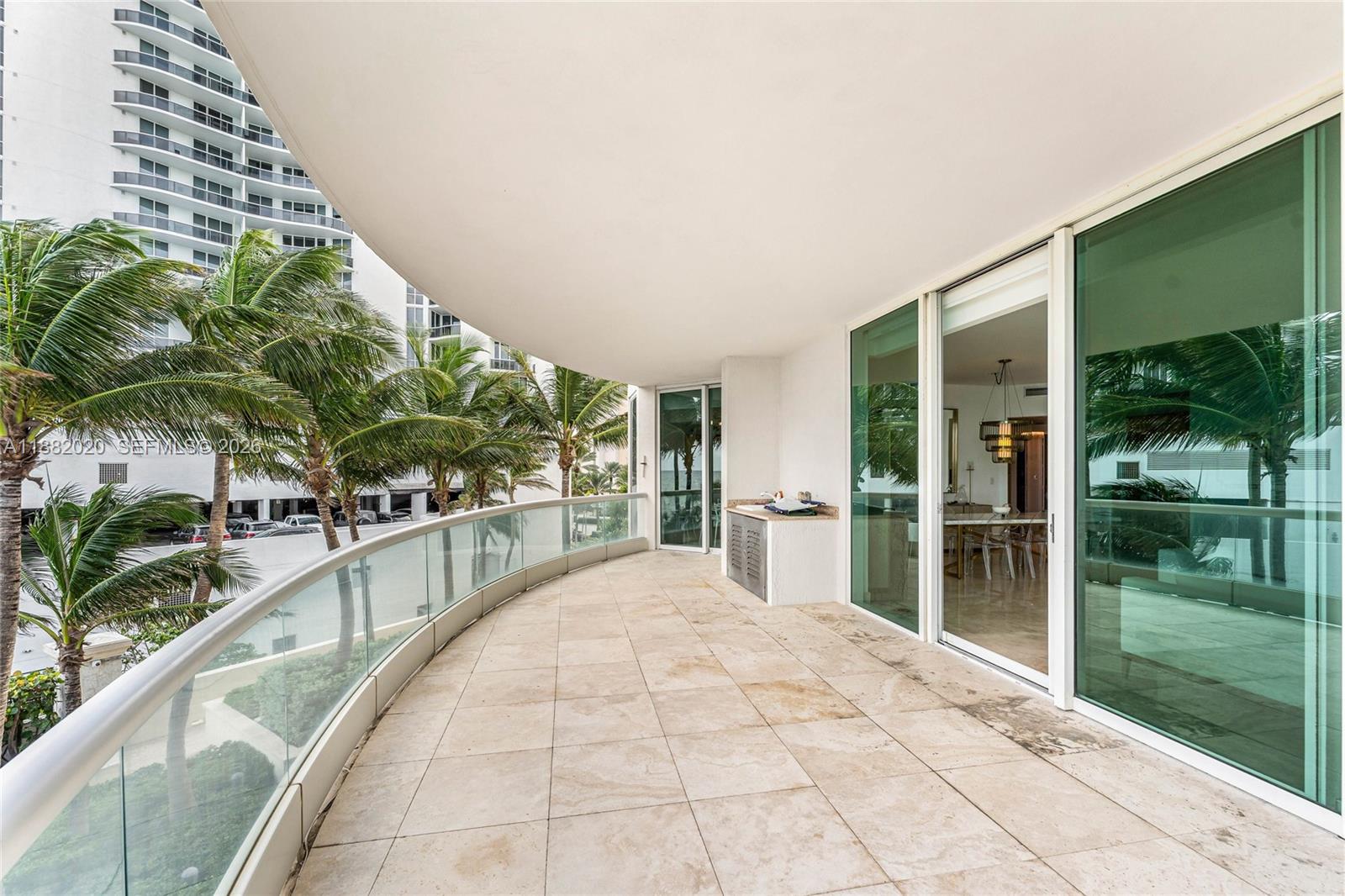 16047 Collins Ave # 404