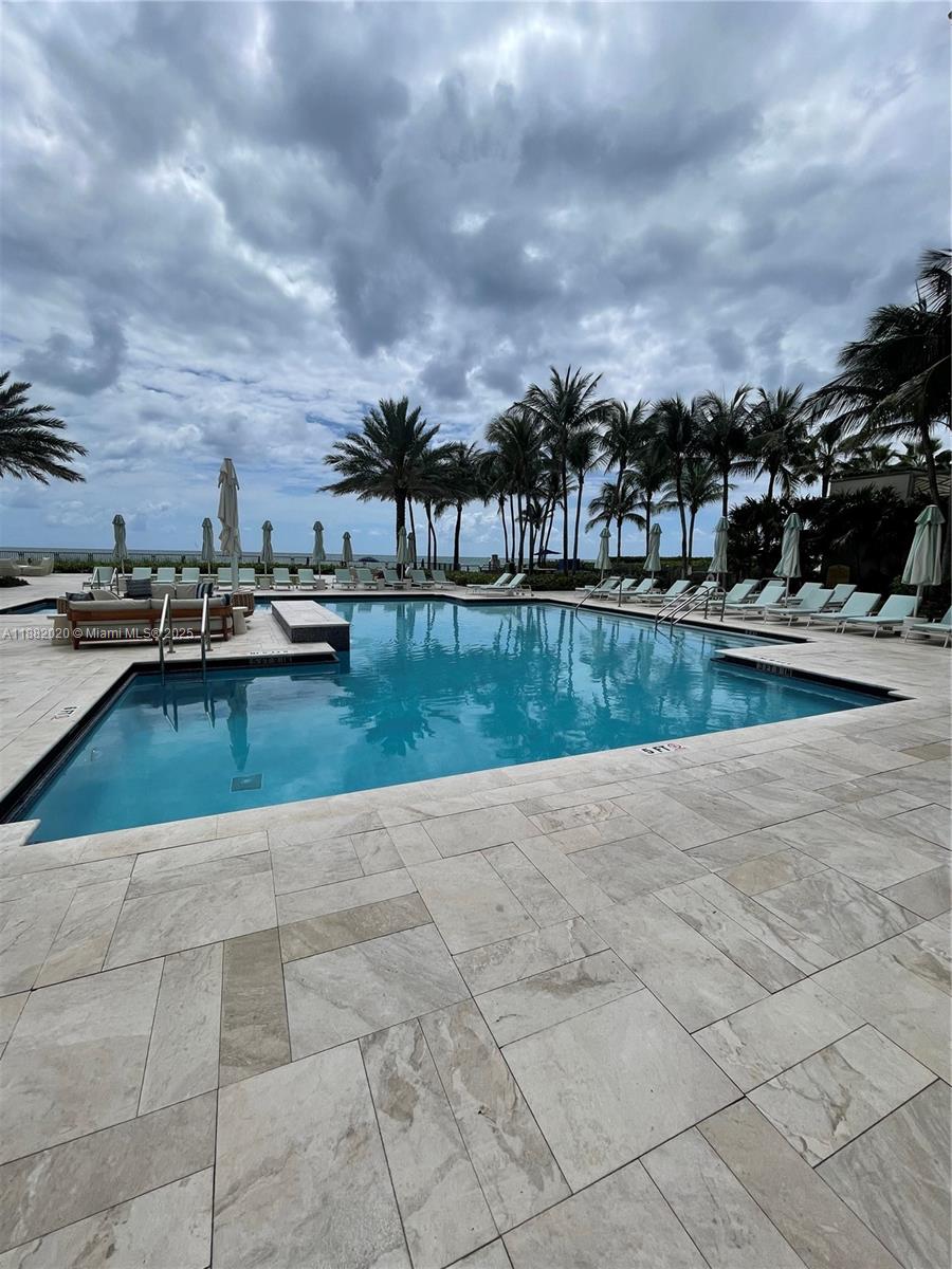 16047 Collins Ave # 404
