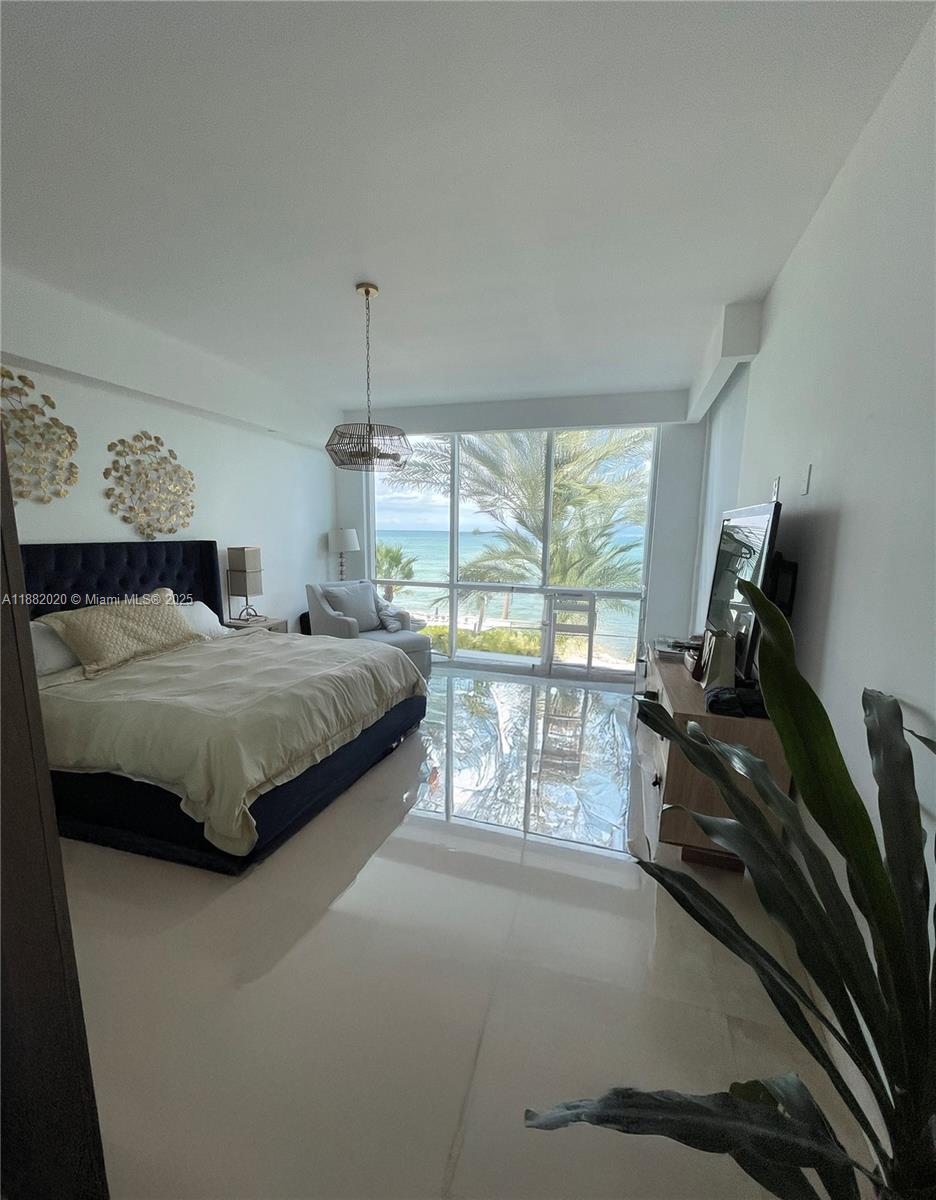 16047 Collins Ave # 404