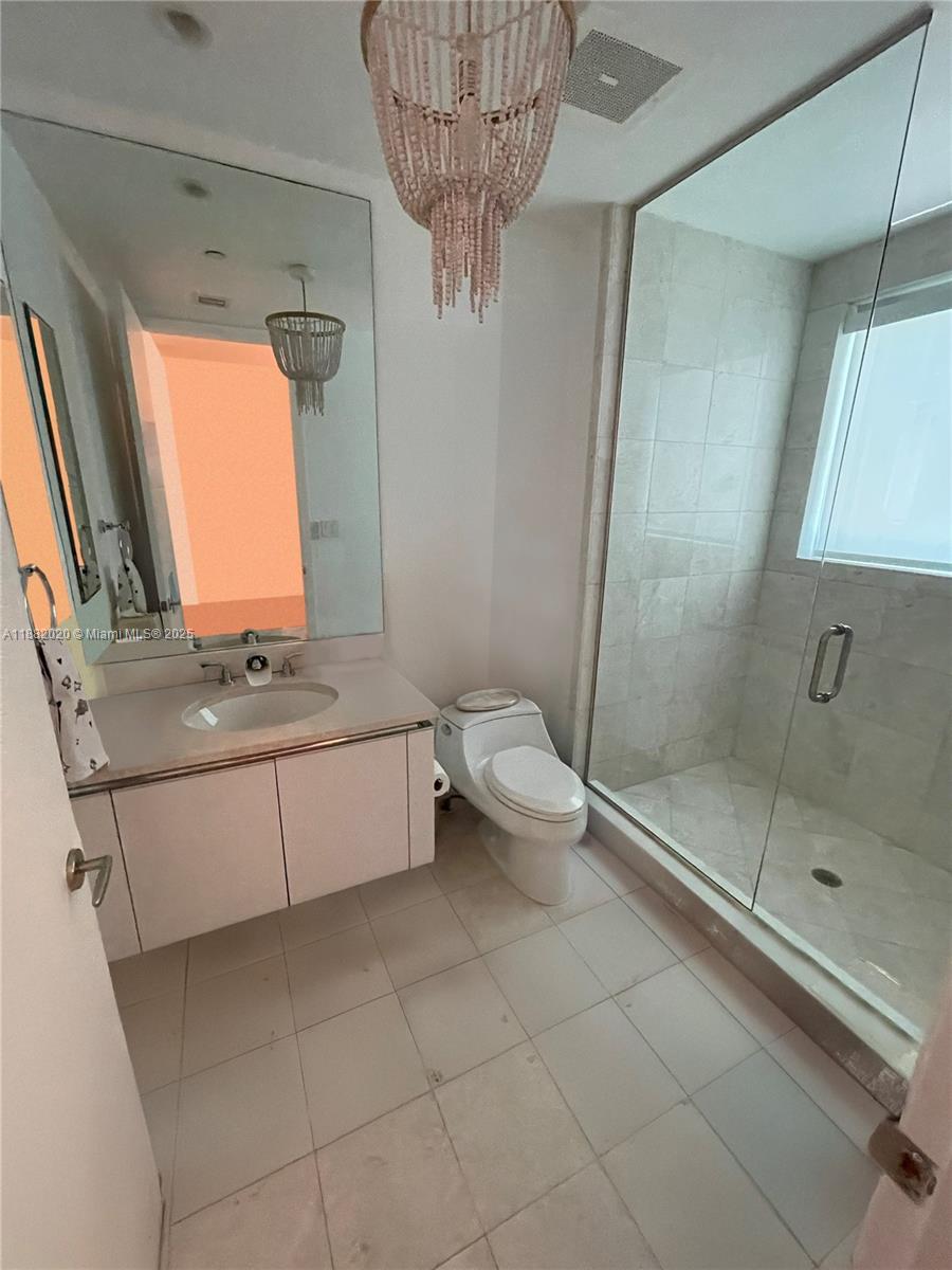 16047 Collins Ave # 404