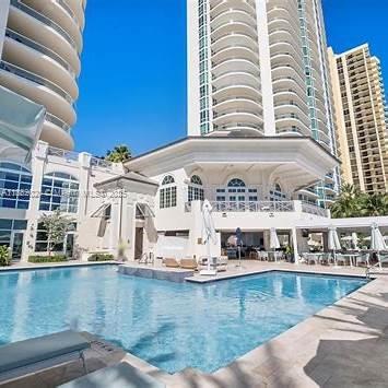 16047 Collins Ave # 404