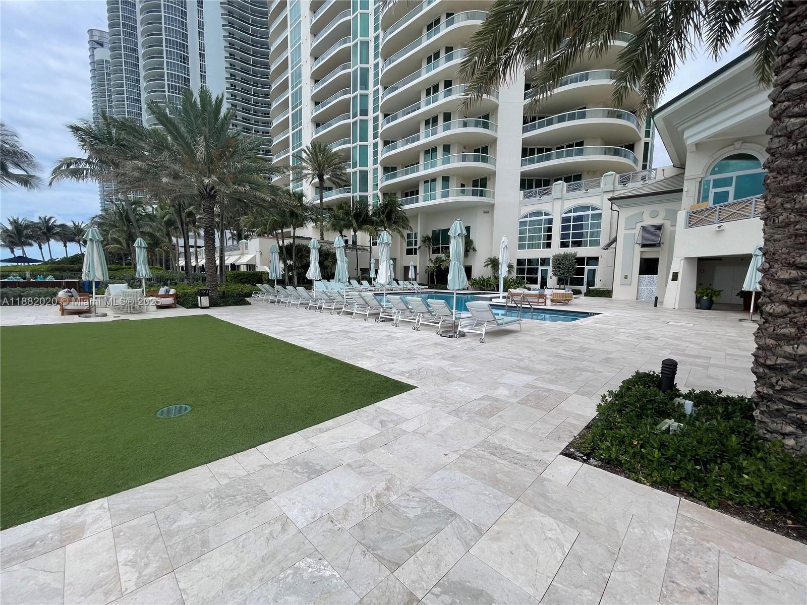 16047 Collins Ave # 404