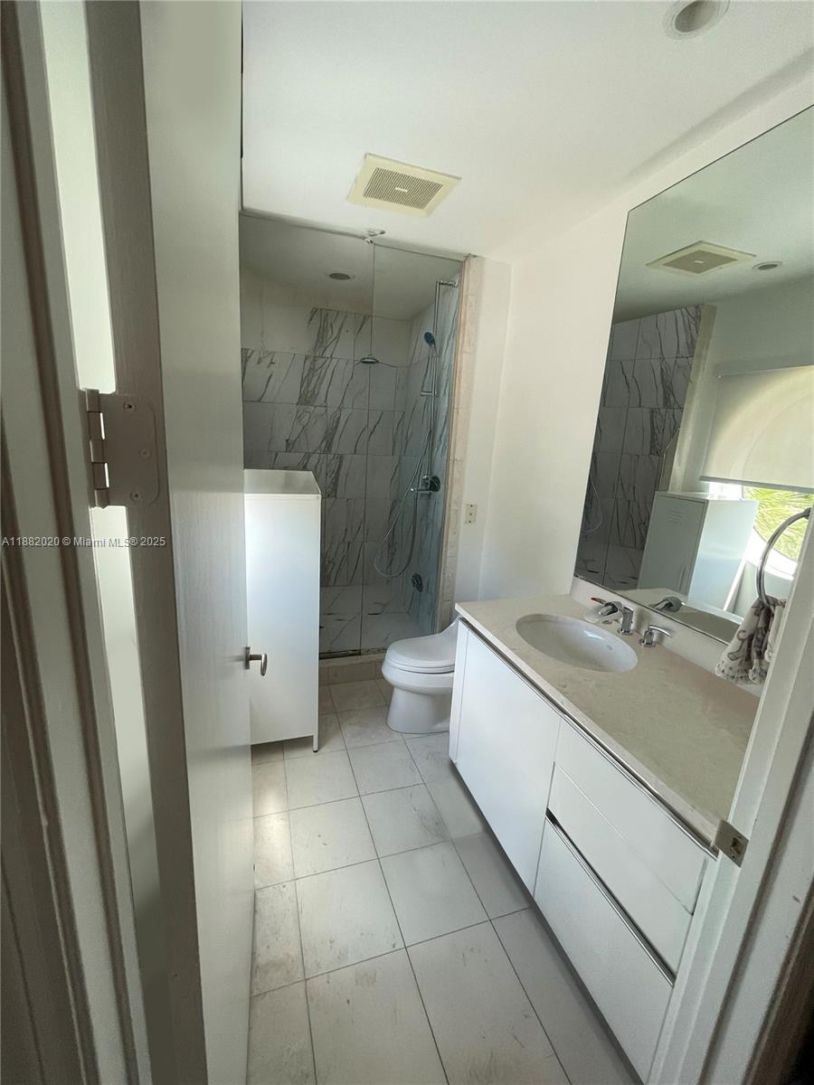 16047 Collins Ave # 404
