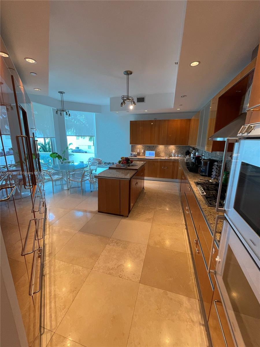 16047 Collins Ave # 404