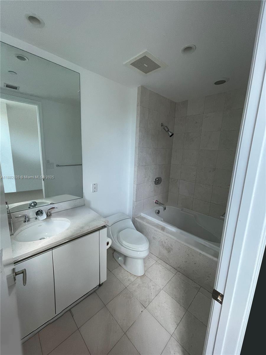 16047 Collins Ave # 404