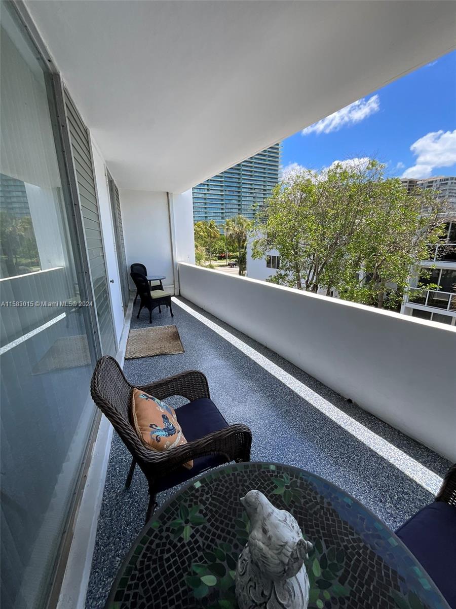 10210 Collins Ave # 305