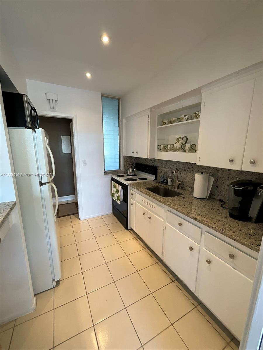 10210 Collins Ave # 305