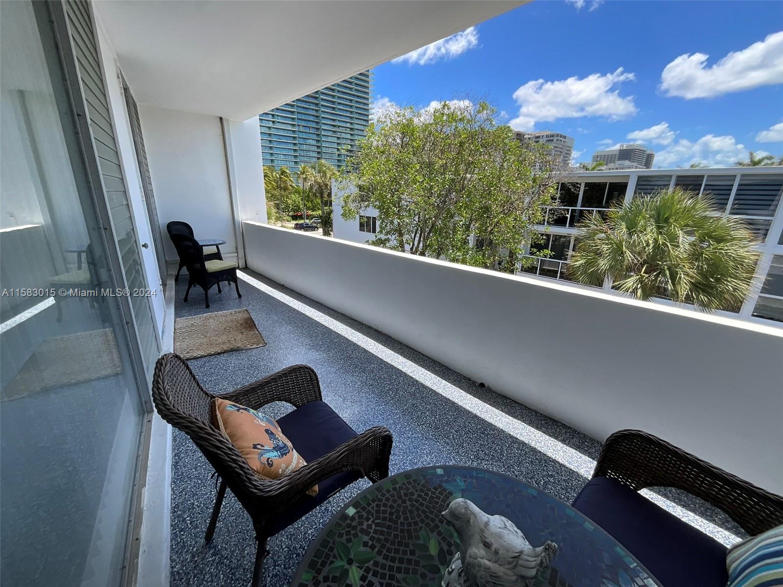 10210 Collins Ave # 305