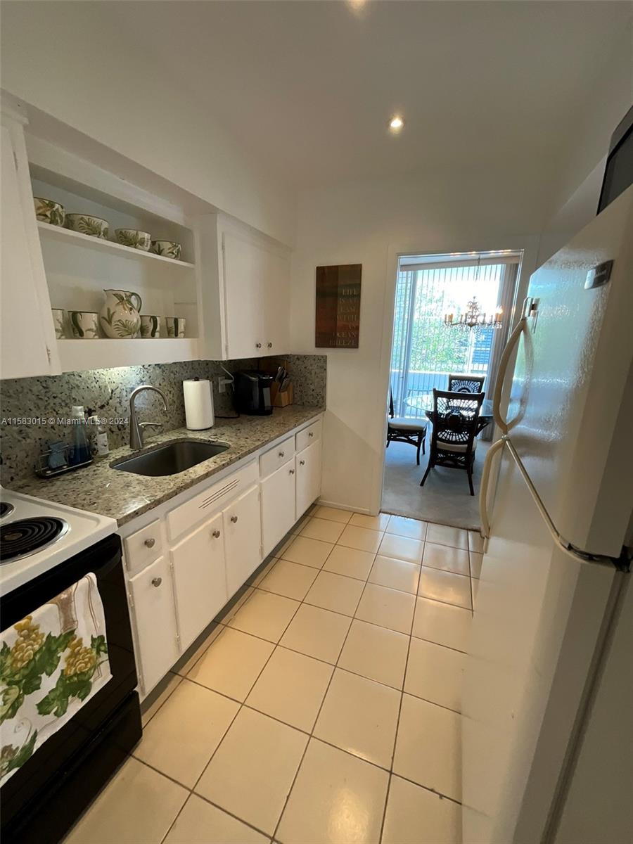 10210 Collins Ave # 305