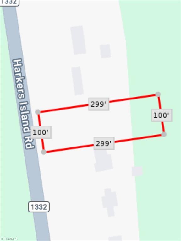 Map of a rectangular parcel beside Harkers Island Road, marked 299 feet by 100 feet.