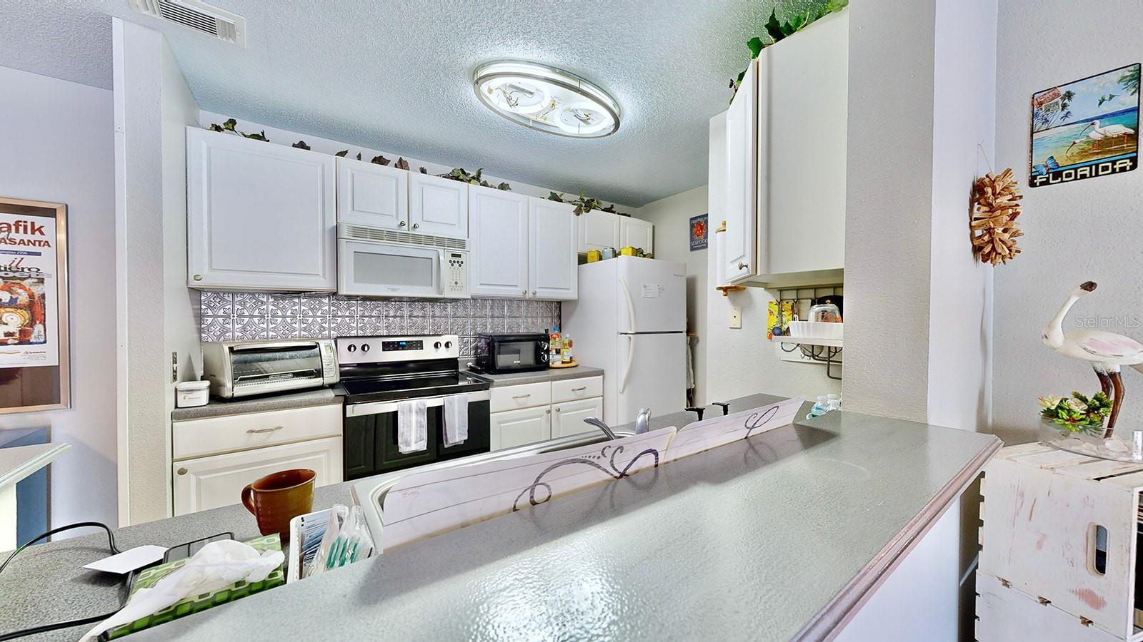 9481 HIGHLAND OAK DR #315