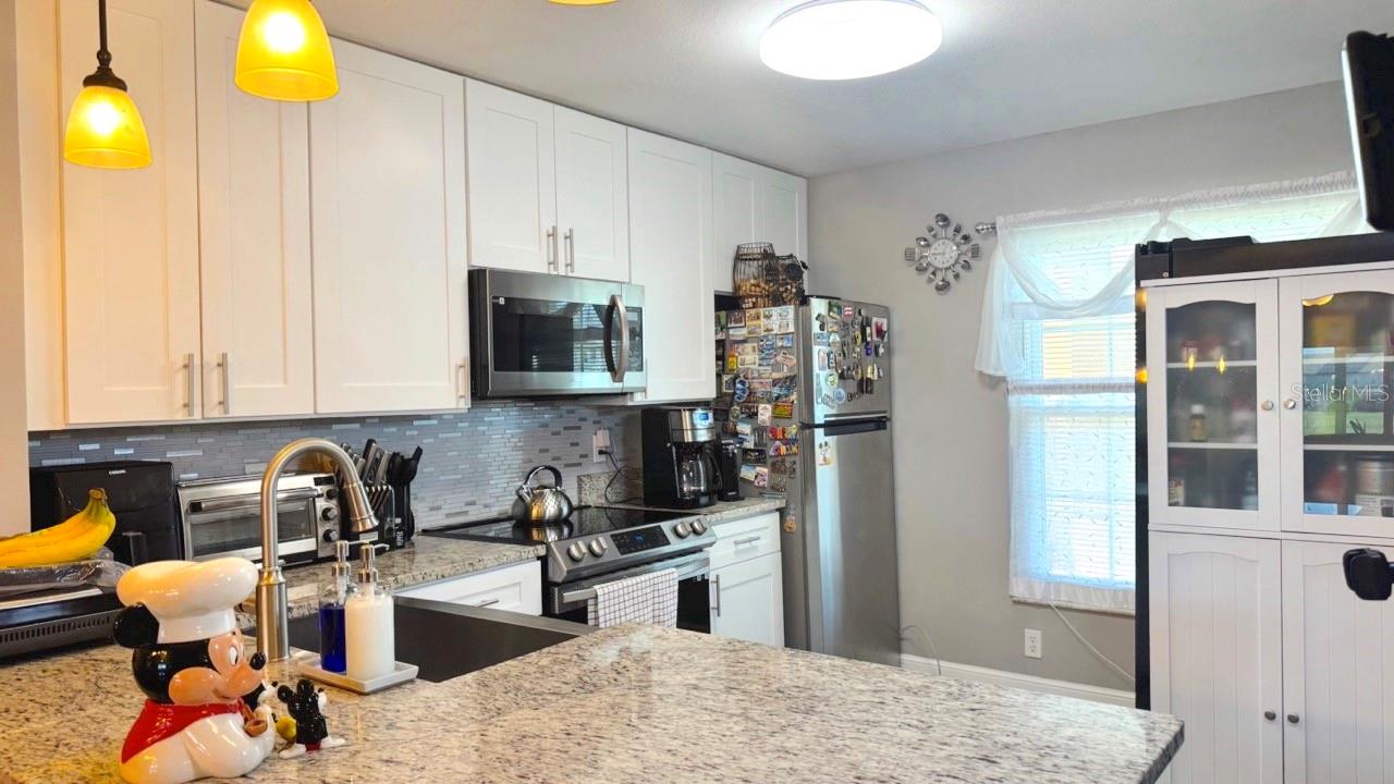 13840 TIMBERBROOKE DR #103