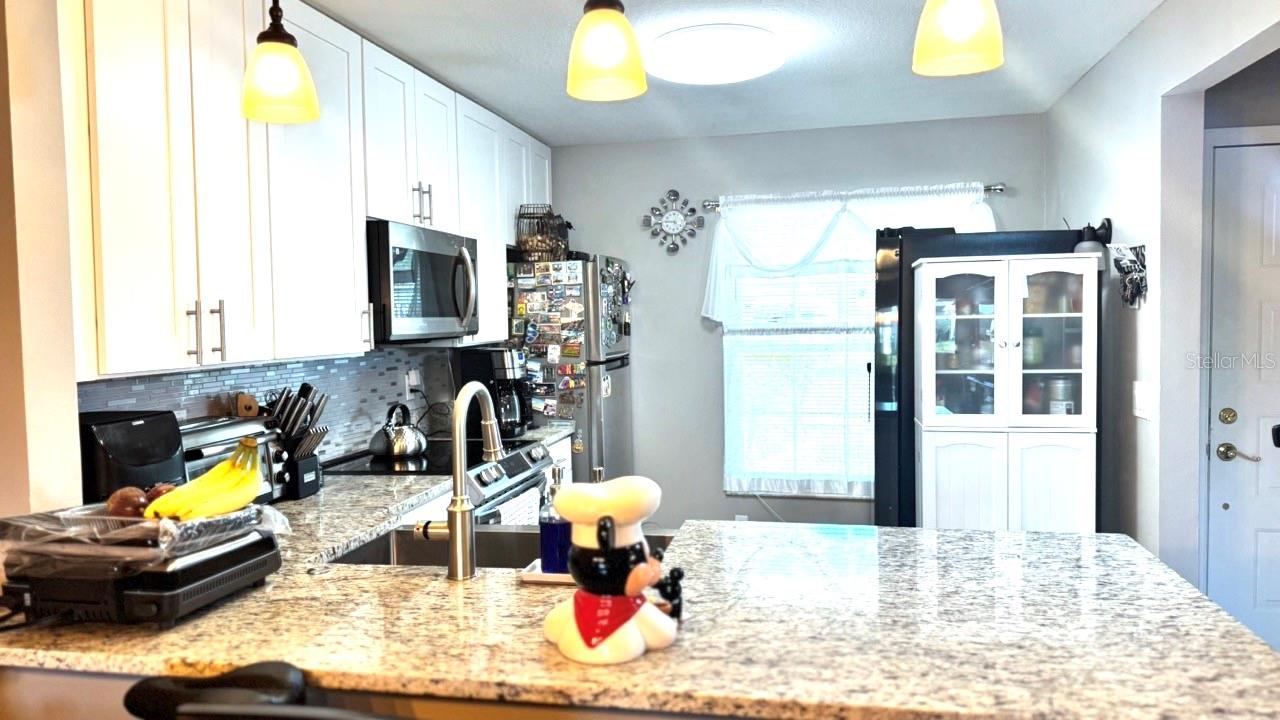 13840 TIMBERBROOKE DR #103