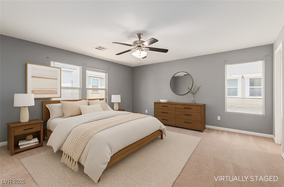 Virtually staged bedroom with a wooden bed, white bedding, gray walls, and matching wood furniture.