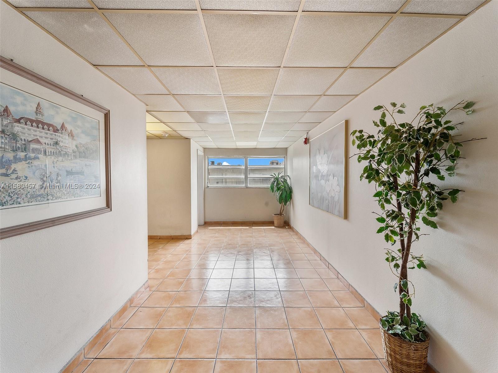 309 S Royal Poinciana Blvd # 401